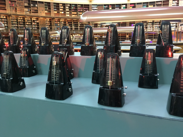 Rows of clockwork metronomes